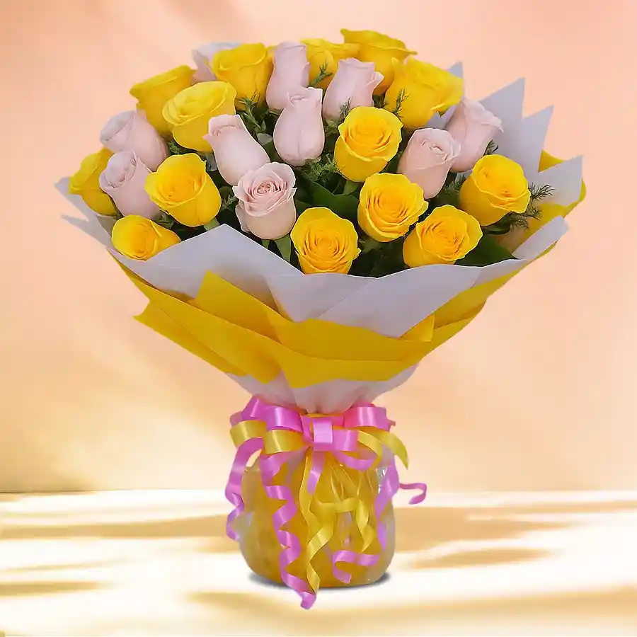 Luminous Flowers Bunch featuring 50 yellow and pink roses, wrapped in tissue for a 25th anniversary celebration.