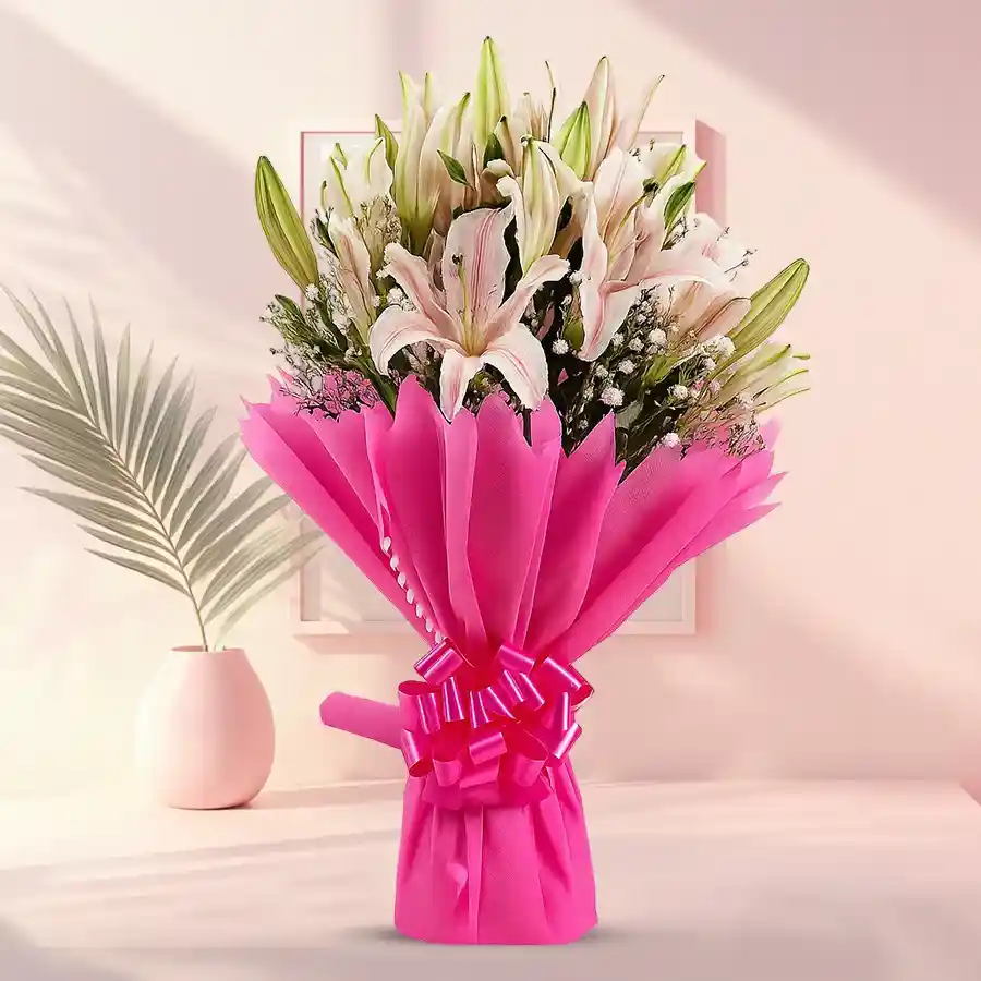 Lovely bouquet featuring 5 lilies and 8 gladiolus, elegantly wrapped in tissue.