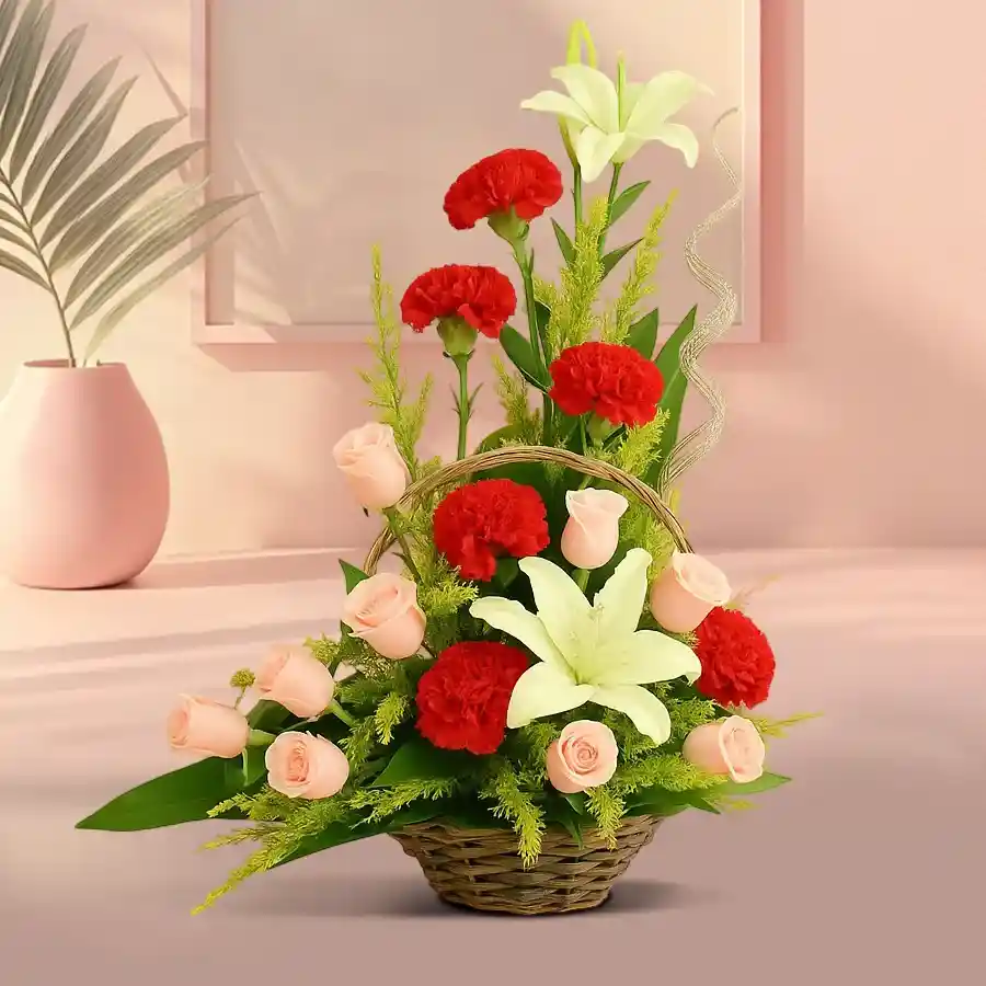 A vibrant basket featuring 20 mixed flowers, including pink roses, red carnations, and white lilies, ideal for special occasions and heartfelt gifts.