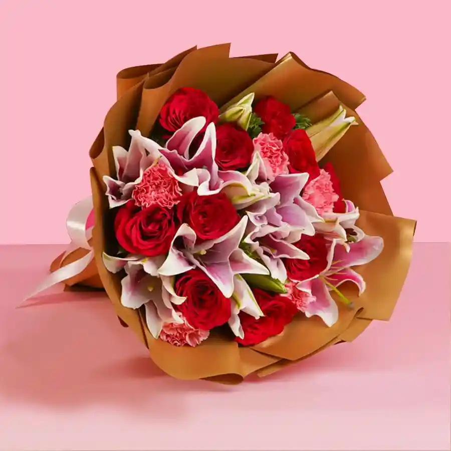 A beautiful bouquet featuring assorted roses and lilies, perfect for expressing love and affection.
