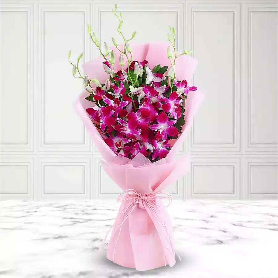Luxurious bouquet of six beautifully arranged orchids in vibrant colors.