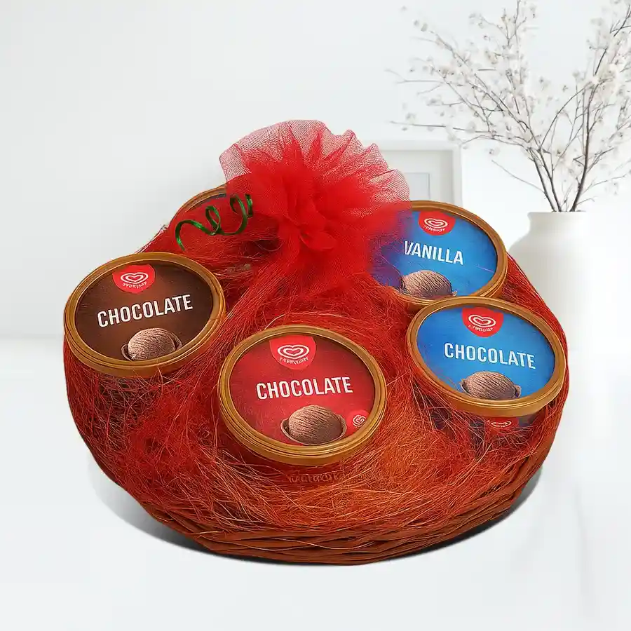 Delightful Ice Cream Surprise Basket featuring assorted Kwality Walls flavors in a reusable gift basket.