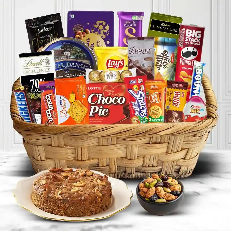 Sumptuous Tempting Gift Basket filled with premium biscuits, crunchy snacks, luscious chocolates, and wholesome dry fruits