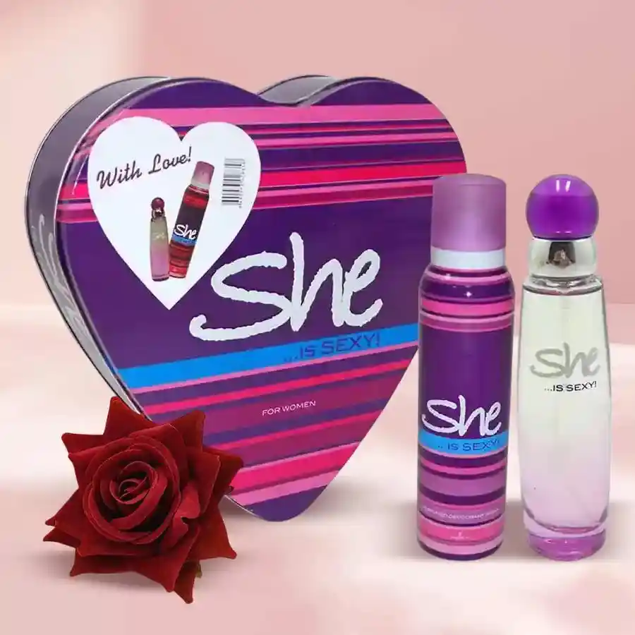 Heart-shaped gift box containing 'She' perfume and a luxurious velvet red rose for Valentine's Day سواری.