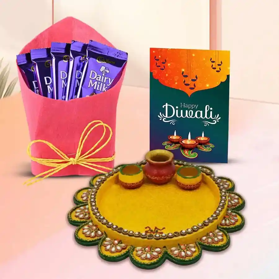 Scintillating Diwali Combo featuring Cadbury Dairy Milk chocolates, a decorative Diwali Thali, and a heartfelt Diwali card.