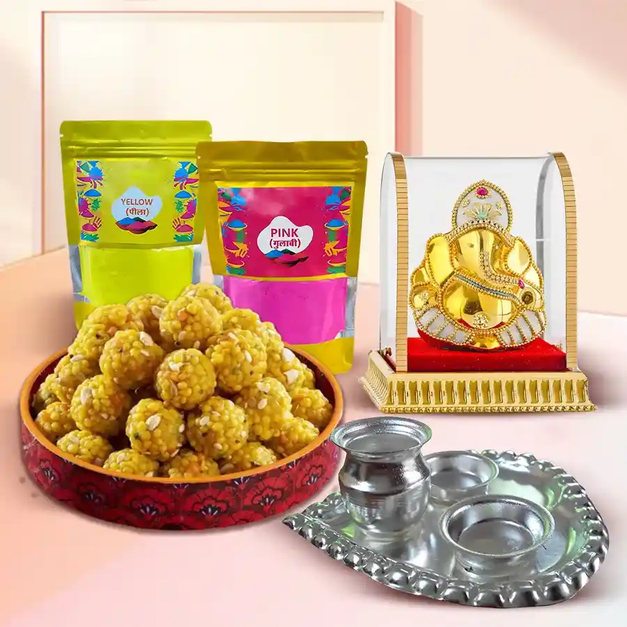Blissful Holi Hai Gift Hamper featuring Boondi Ladoo, Vighnesh Ganesh idol, silver-plated paan-shaped thali, and vibrant gulal.