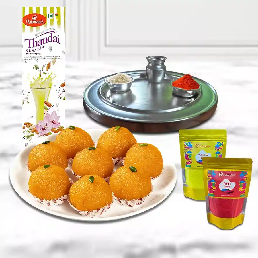 Joyful Holi Selection featuring colorful gulal, a silver-plated puja thali, Haldiram's ladoo, and thandai arranged beautifully
