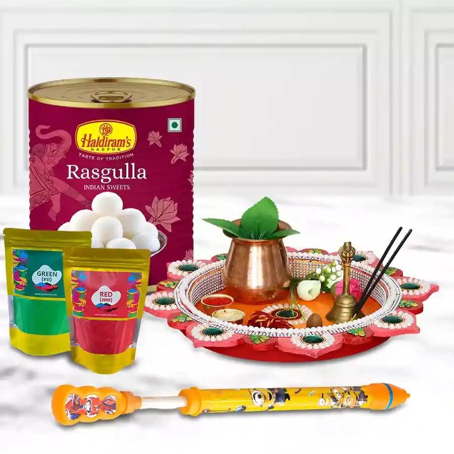 Outstanding Holi gift hamper featuring a designer Pooja Thali, eco-friendly Herbal Gulal, a colorful Pichkari, and Haldiram Rasgulla in vibrant packaging.