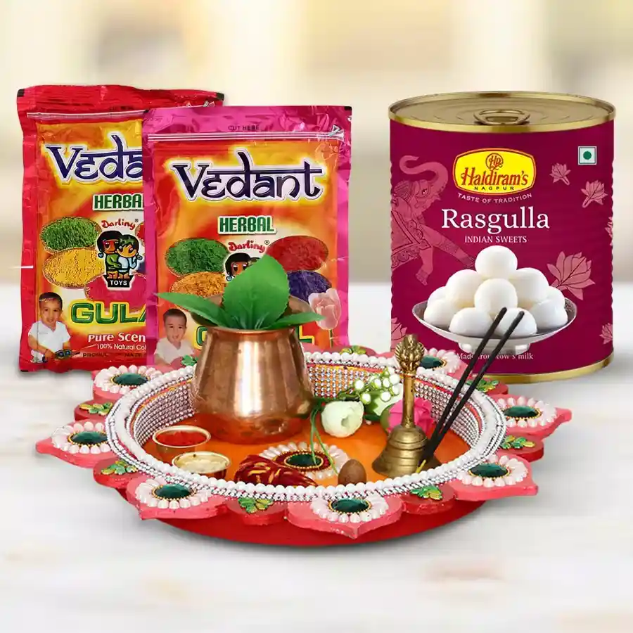 Sweet Enjoyment pack featuring Haldiram Rasgulla, Herbal Gulal packets, and a stylish Puja Thali