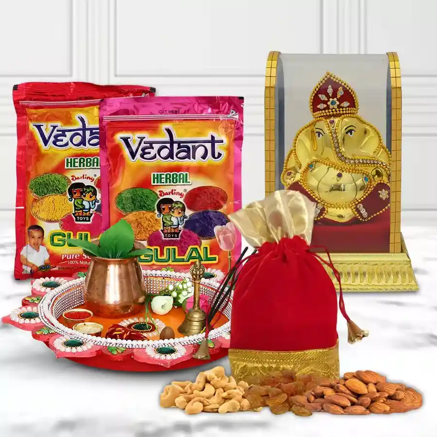 Cheerful Holi combo featuring a Puja Thali with Ganesh Mandap, two packets of herbal Gulal, and a dry fruit potli