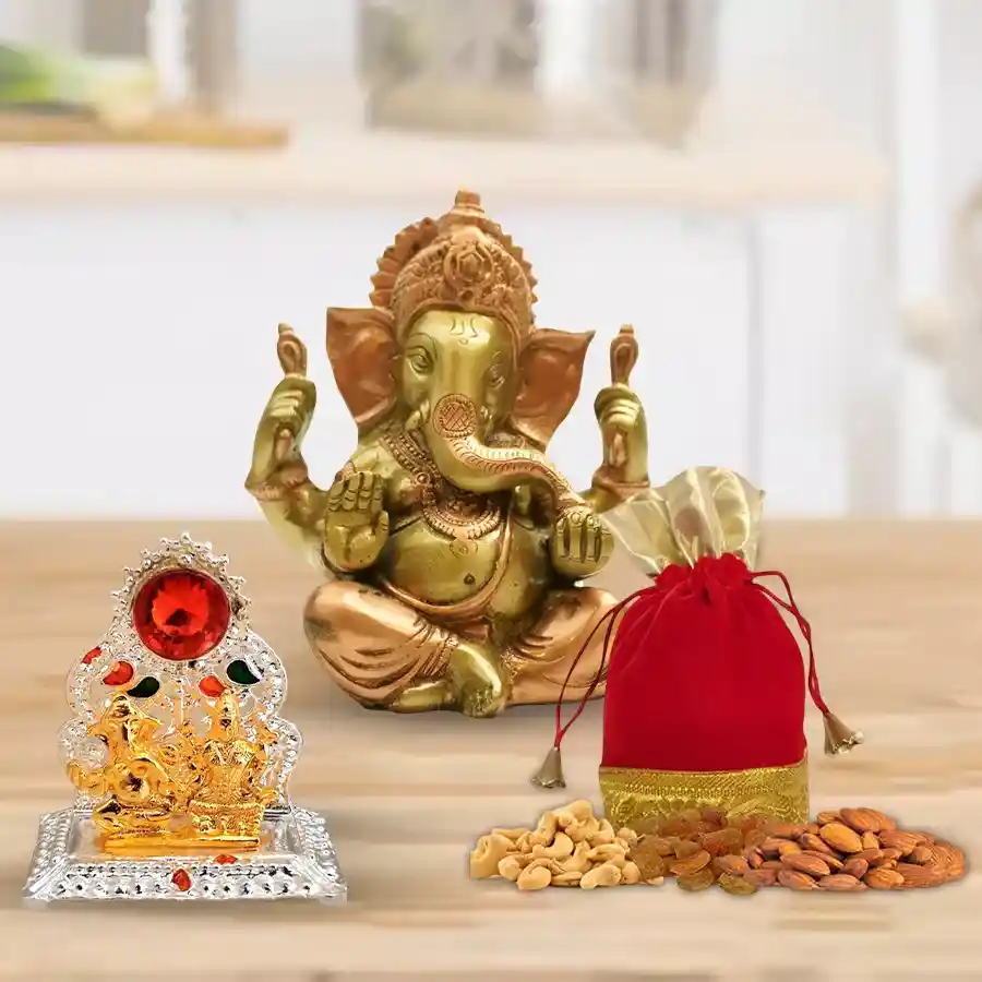 Toothsome Dry Fruits Potli with Mandap and Vighnesh Ganesh Murti, featuring premium dry fruits and a decorative traditional setup