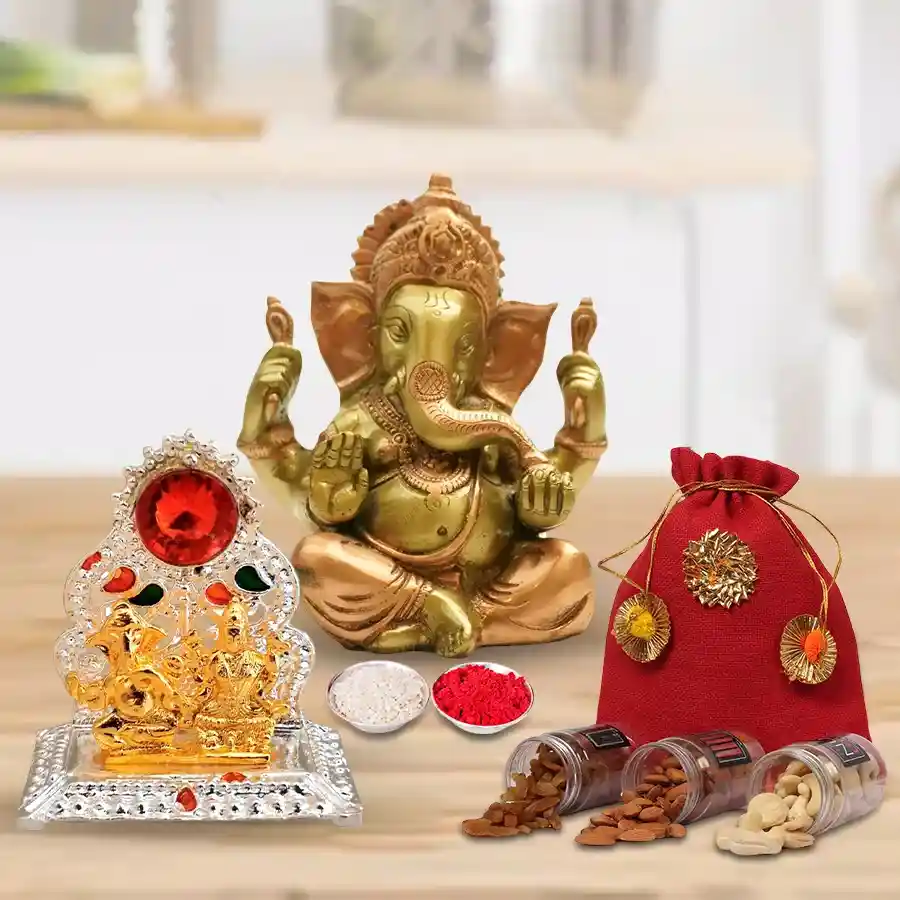 Divine Vinayak Murti set with gold-plated Ganesh idol, antique Mandap, and a potli of assorted dry fruits, accompanied by roli, tika, and chawal for Bhai Dooj celebration.