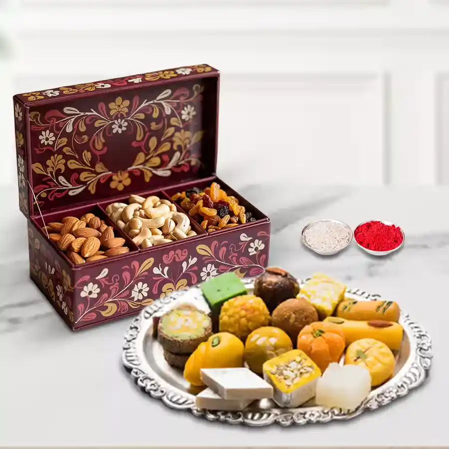 Mixed Sweets and Dry Fruits Combo for Bhai Dooj featuring almonds, cashews, raisins, and Haldirams sweets with free Roli, Tika, and Chawal