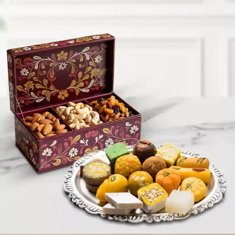 Assorted dry fruits and sweets from Haldiram beautifully packaged as a gift.