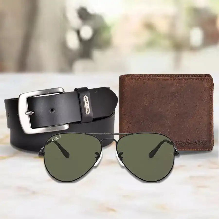 Gift hamper for men featuring a black leather wallet, black buffalo belt, and aviator style sunglasses arranged stylishly.