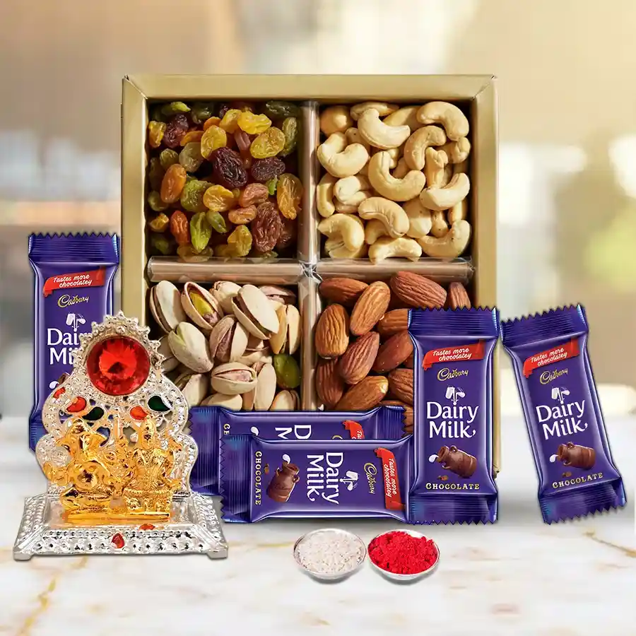 Lovely combo of dry fruits with Cadbury Dairy Milk chocolates and a Ganesh Lakshmi Mandap for Bhai Dooj celebration