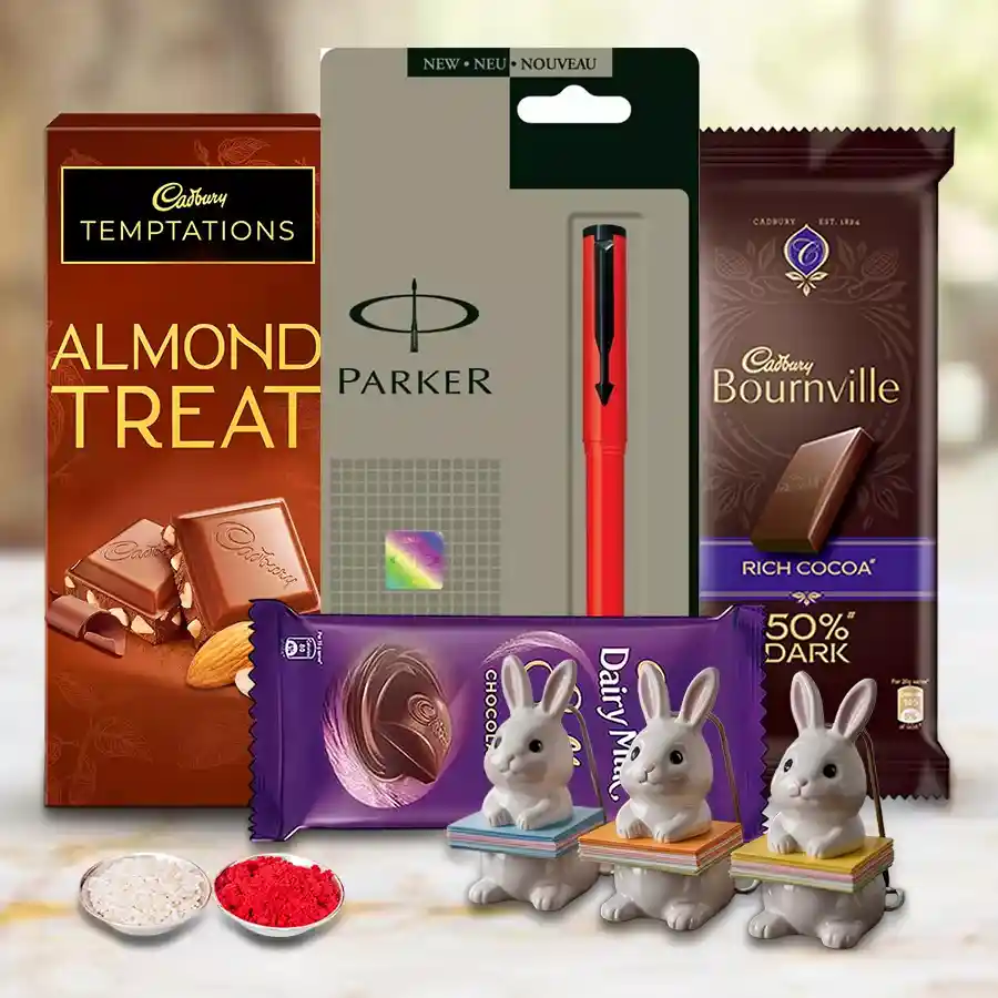 Exclusive Chocos N Assortments Gift Combo featuring a Parker Beta pen, various Cadbury chocolates, Bunny paper holders, and complimentary Roli, Tika, and Chawal for Bhai Dooj celebrations.