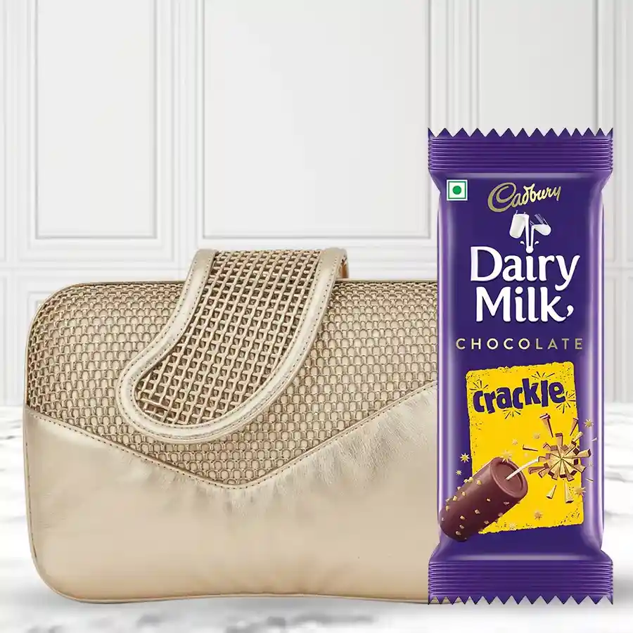 Chic Polish Ladies Clutch in white with elegant patterns alongside two Cadbury Dairy Milk bars: Fruit & Nut and Crackle.