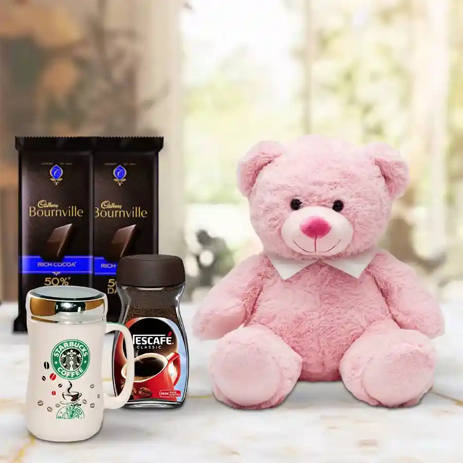 Coffee with Santa Claus Hamper featuring an 8-inch teddy bear, Cadbury Bournville chocolates, a Starbucks coffee mug, and premium Nescafe coffee