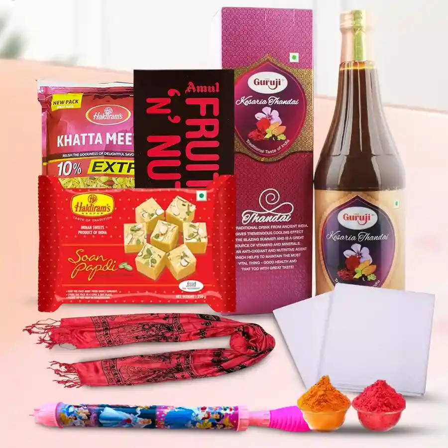 Perfect Holi Gifts bundle featuring a white kurta pajama, vibrant traditional scarf, Kesar Thandai, Amul Fruit n Nut, Haldirams Elaichi Soan Papdi, Khata Meetha Mixture, herbal gulal, and a pichkari.
