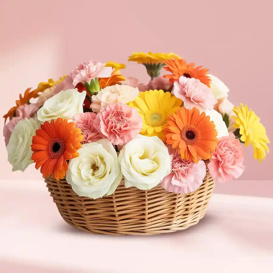A vibrant basket filled with ten roses, five carnations, and five gerberas, showcasing a stunning mixed flowers arrangement.
