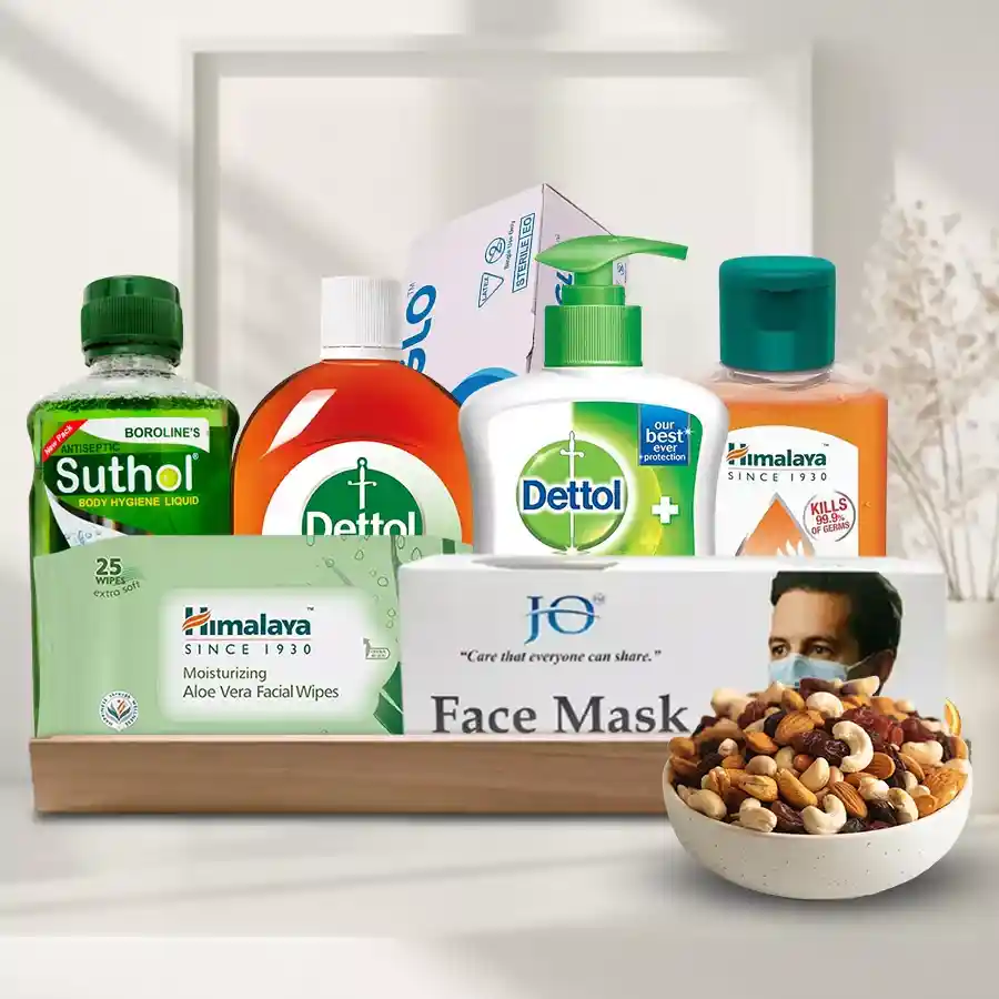 Gifts Hamper for brother featuring sanitizers, antiseptics, liquid soap, face masks, gloves, facial wipes, and assorted dry fruits in a stylish tray