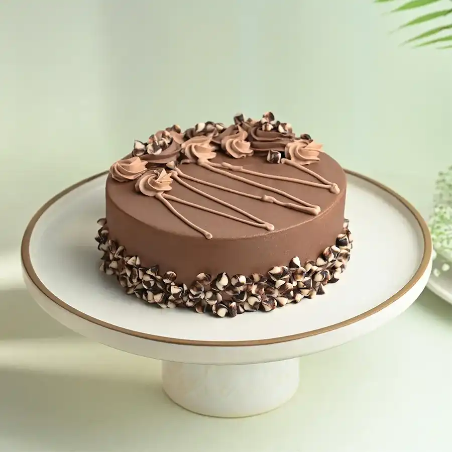 A 1 kg Decadent Chocolate Delight Cake from 5 Star Bakery, ideal for celebrations and special moments, visually rich and inviting.
