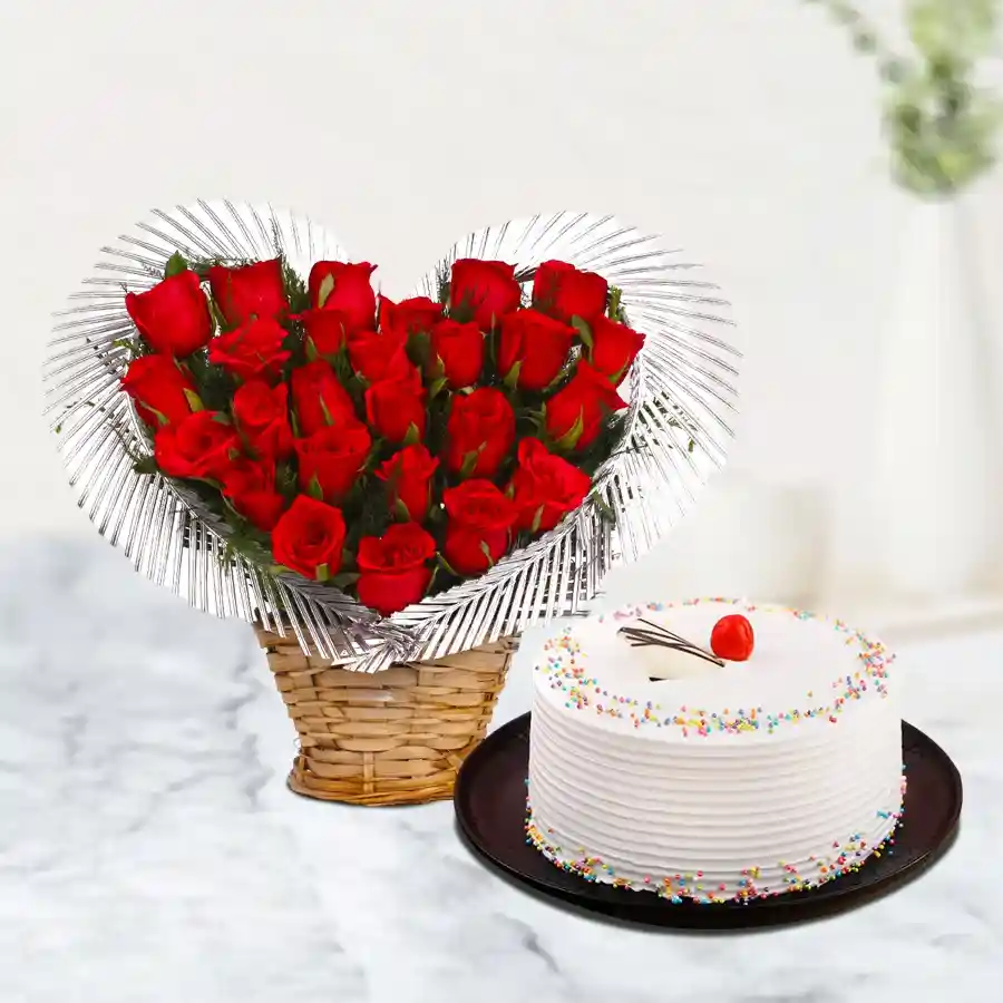 1 kg Vanilla Cake from 5 Star Bakery with 24 red roses in a heart arrangement.