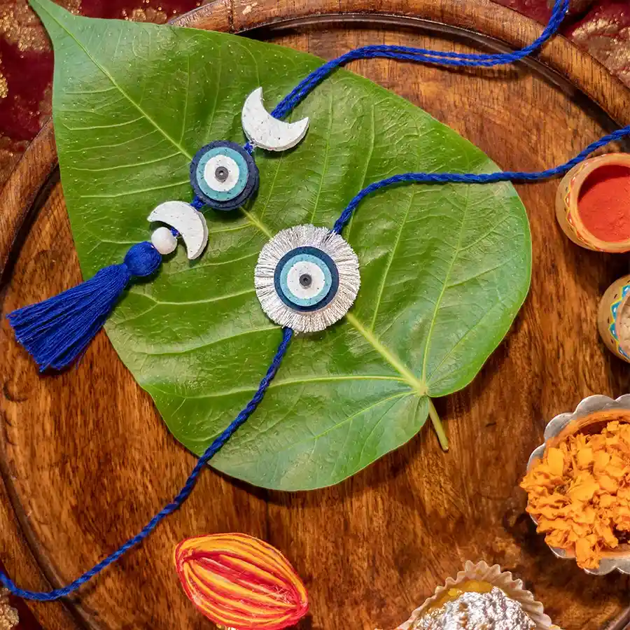 Handcrafted eco-friendly rakhi set featuring plantable rakhis and marigold seed ball.