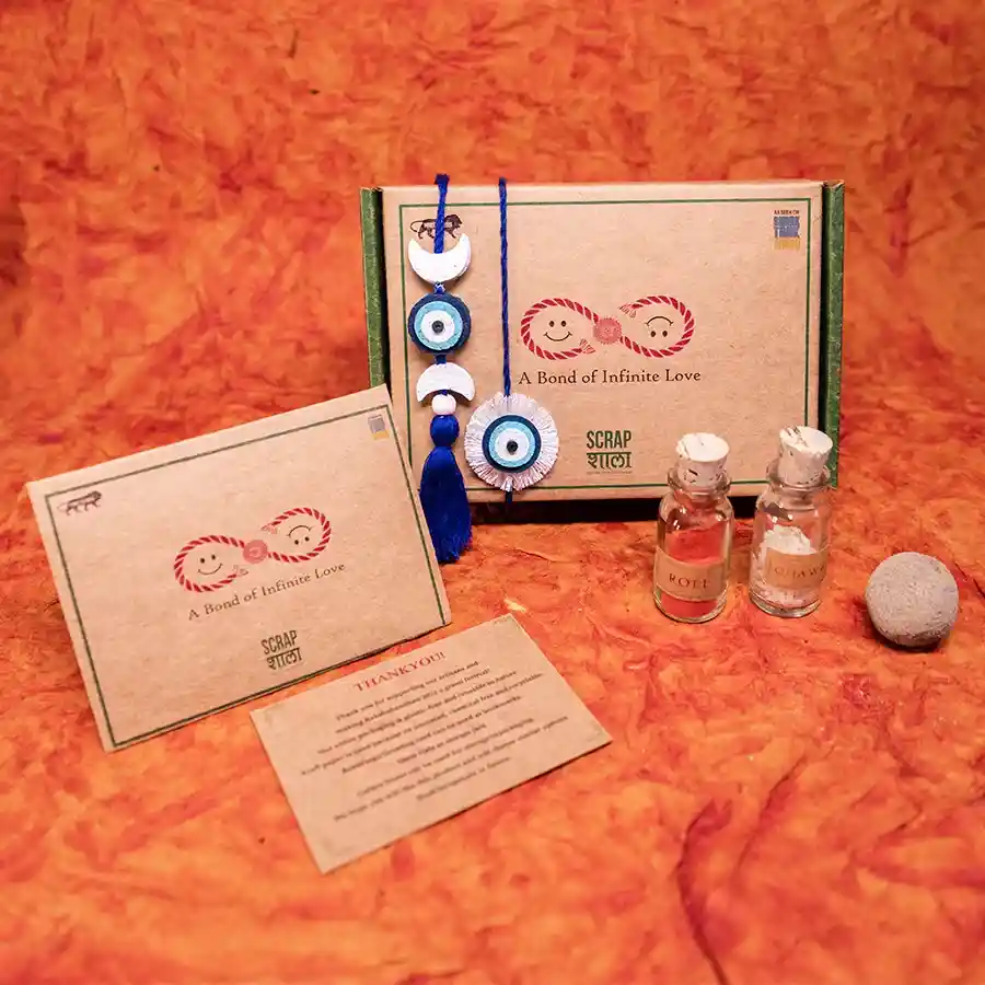 Eco-Conscious Rakhi N Lumba Gift Box with plantable rakhis and marigold seed ball.
