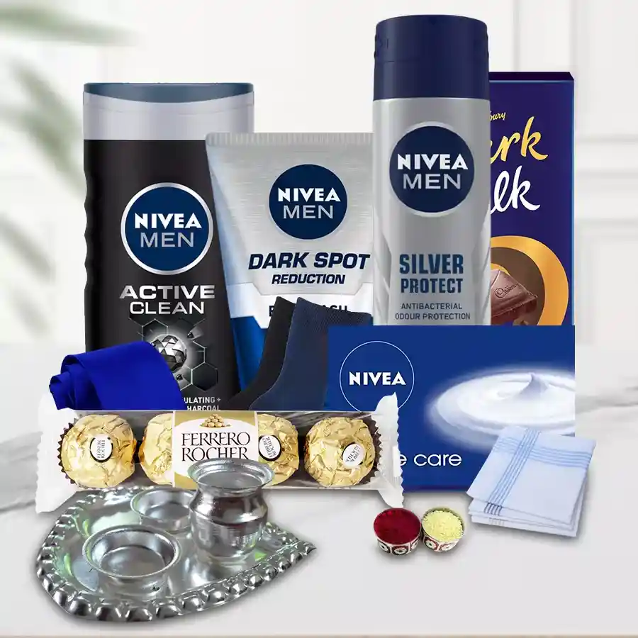 Exclusive Gift Hamper for Men featuring Nivea products, Ferrero Rocher, Cadbury dark milk chocolates, a blue tie, cotton handkerchiefs, formal socks, a pooja thali, roli, tika, and chawal.