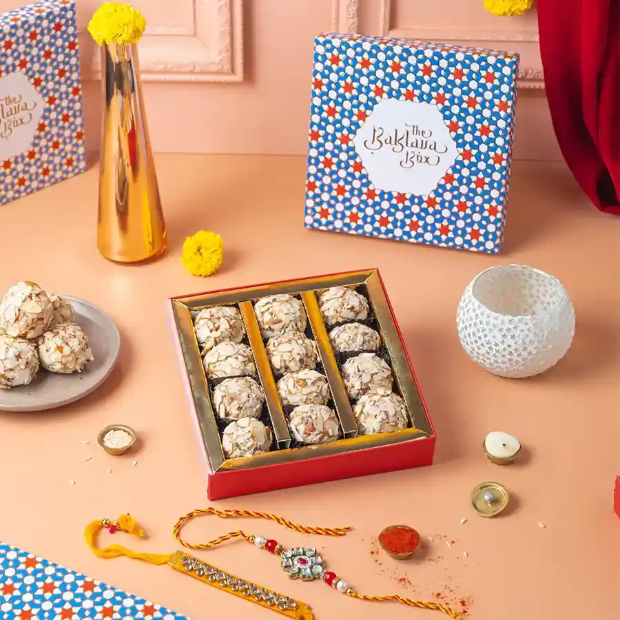 Almond Truffle and Rakhi Celebration Set featuring gourmet truffles and beautiful rakhis for a heartfelt gift experience.