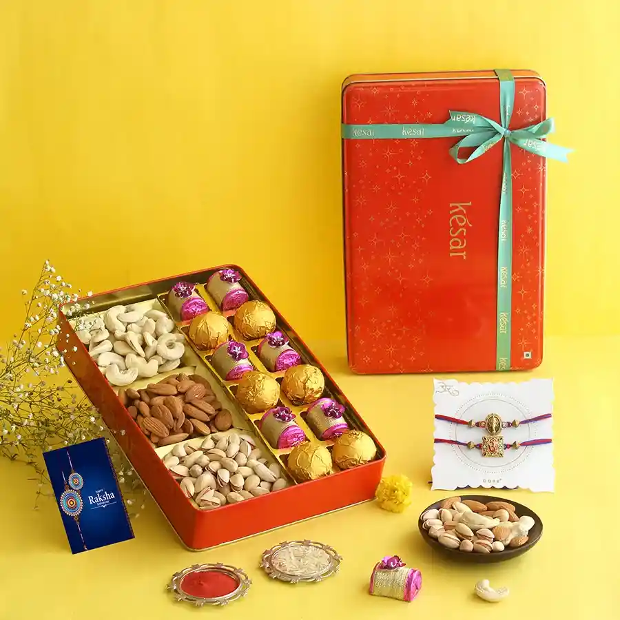 Rakhi Bliss Gourmet Treats Hamper featuring sweets, nuts, and Rakhis.