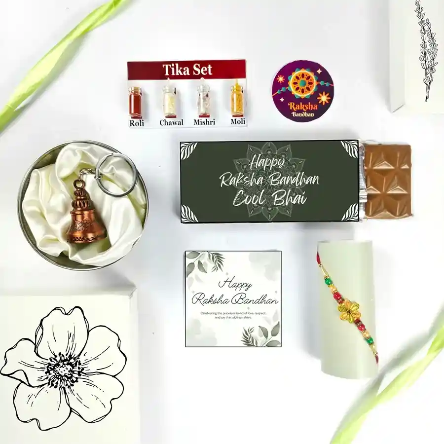 Enchanting Rakhi Bond Gift Set featuring a stylish Rakhi, chocolate bar, guardian bell, greeting card, and Tika set, perfect for Raksha Bandhan.