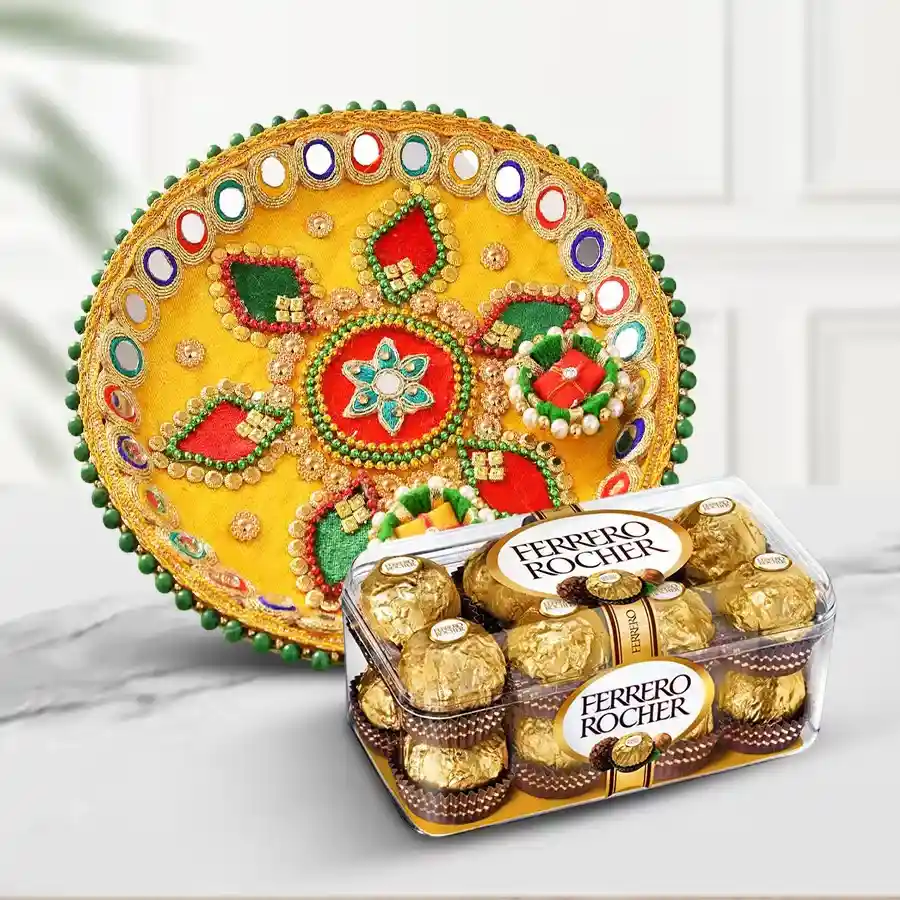 Ferrero Rocher chocolates arranged on a decorative Pooja Thali, featuring 16 pieces of chocolate surrounded by traditional elements.