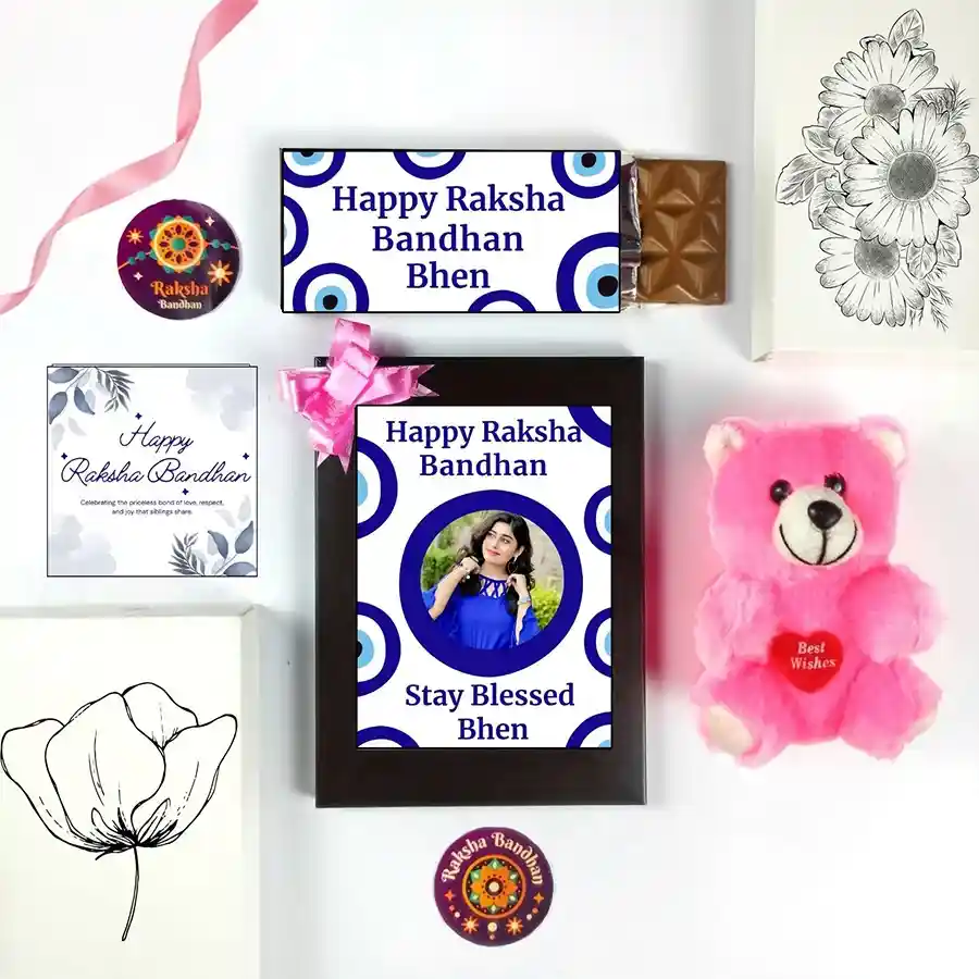 Sweet Sentiments Rakhi Surprise Set featuring a chocolate bar, photo frame, teddy bear, and greeting card.