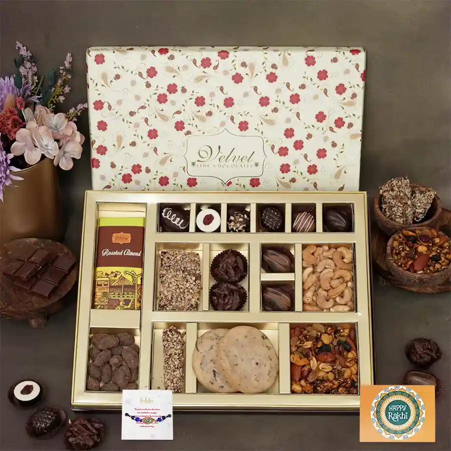 Savory Sweet Delight Rakhi Set with Evil Eye Rakhi and assorted treats.