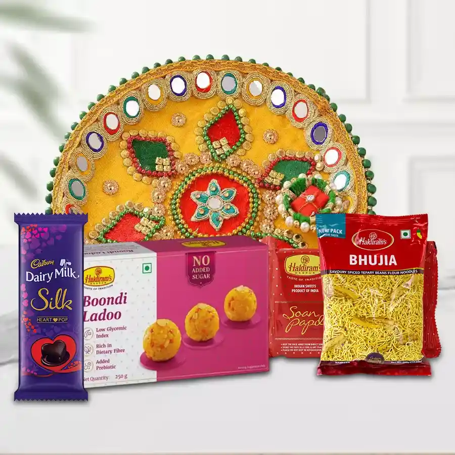 Haldirams Assortment Cadbury Chocolate and Pooja Thali featuring Boondi Ladoo, Soan Papdi, Bhujia, and Cadbury Silk Chocolate Heart