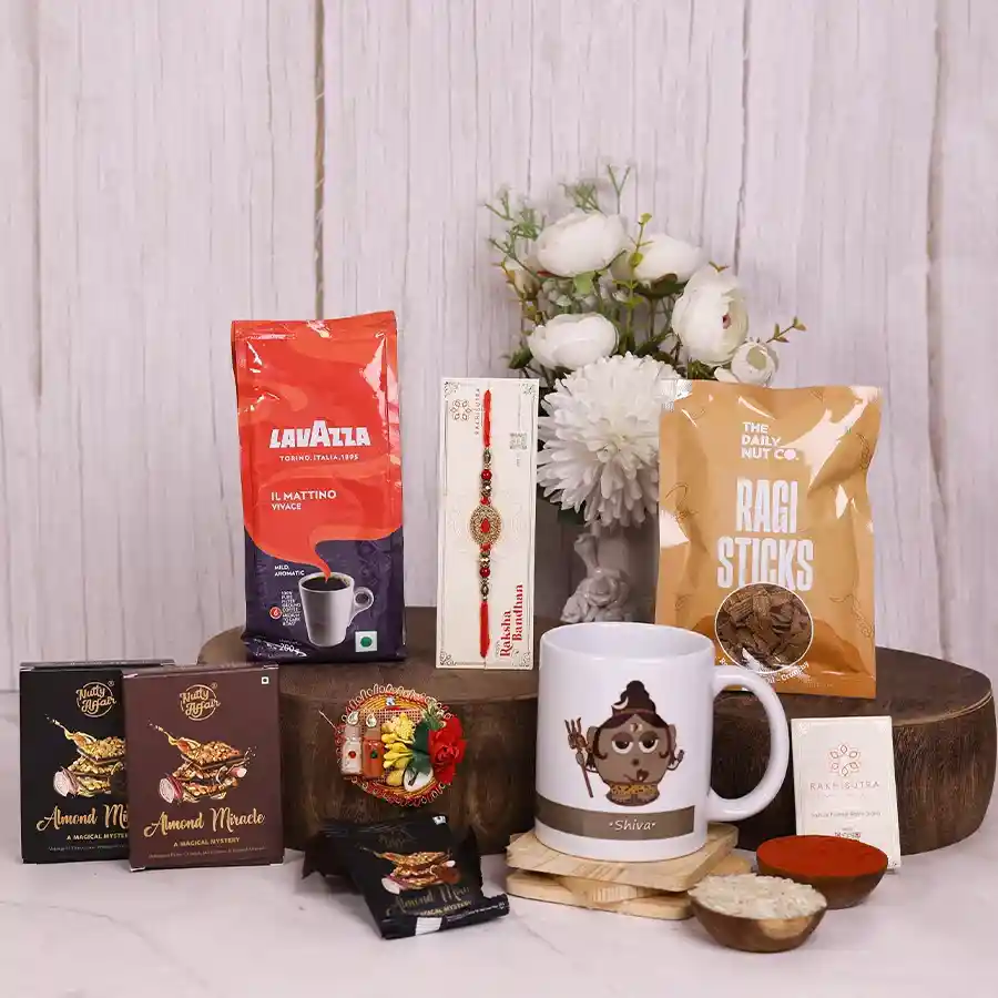 Raksha Bandhan Joyful Rituals Box with premium rakhi, coffee, brownies, and personalized mug.