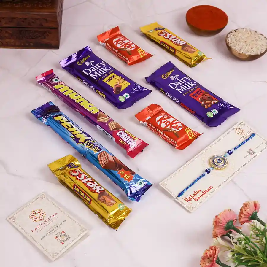 Enchanting Rakhi Delight Gift Set with chocolates and a Rakhi in a reusable box.