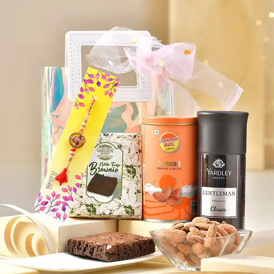 Sacred Rakhi & Gourmet Treats Combo with Ganesha Rakhi, body spray, and gourmet snacks.