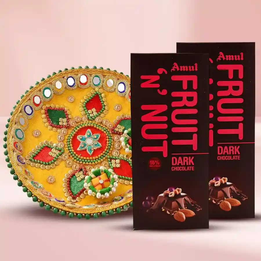 2-pack Amul Fruit & Nut Chocolate Bars alongside a beautifully designed Pooja Thali