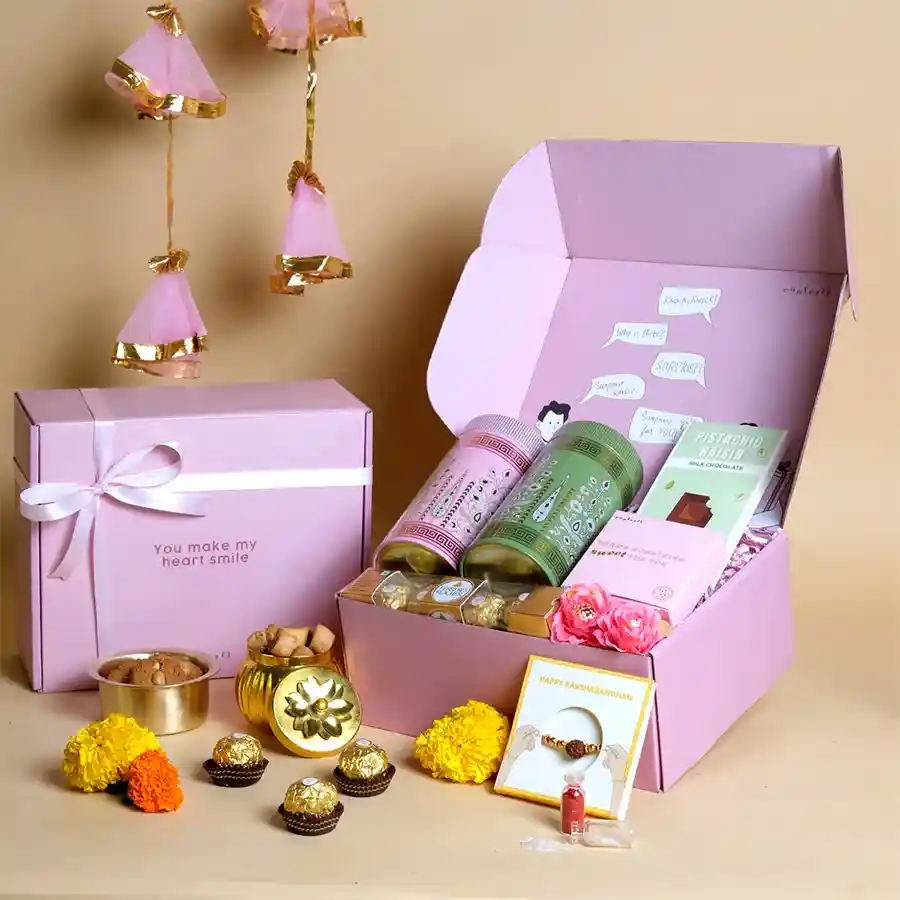 Sweet Treats & Rakhi Harmony Set with Rudraksha and gourmet snacks.