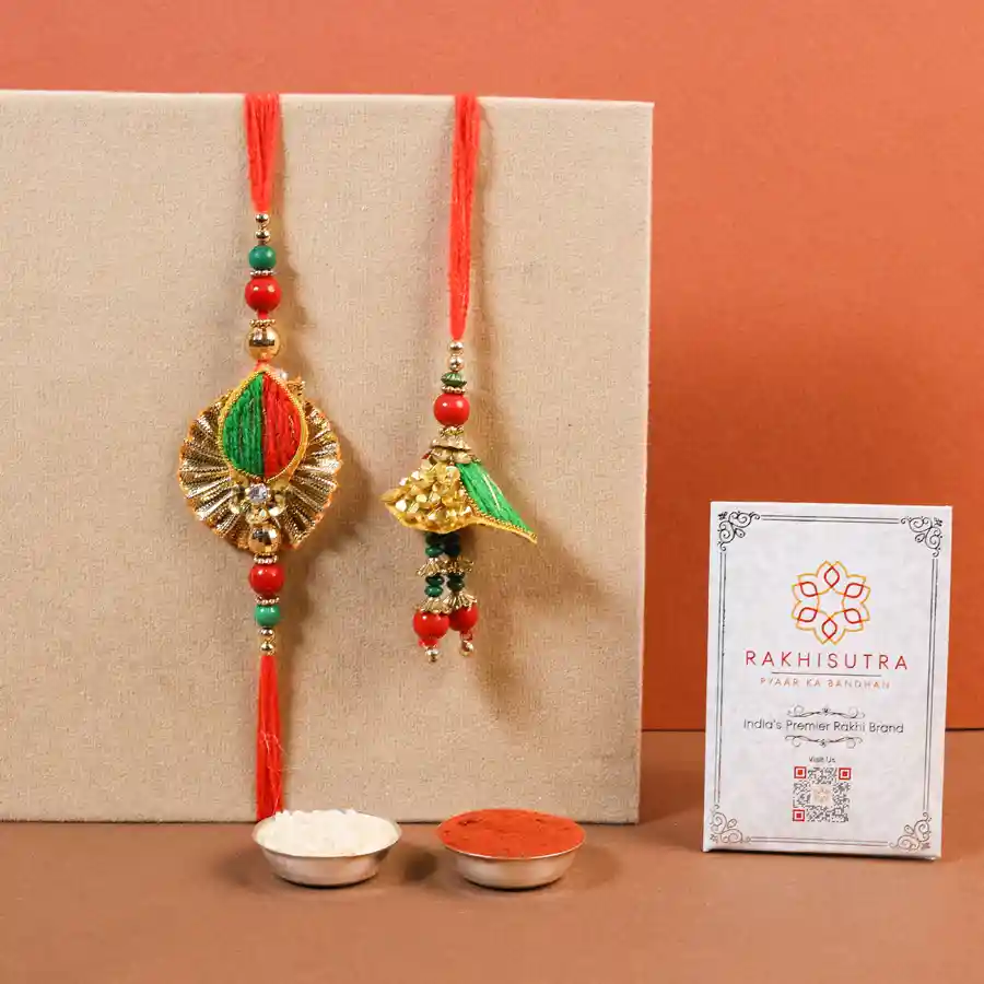 Thoughtful Bhaiya Bhabi Rakhi set with complimentary Roli Tika.