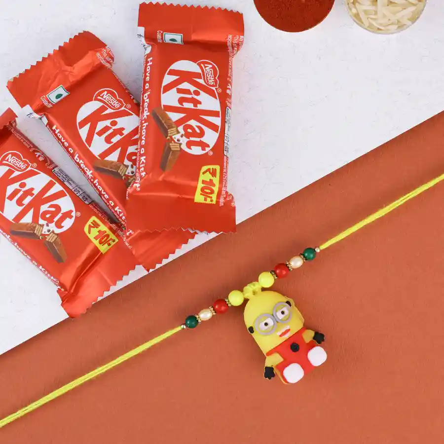 Colorful Minion Rakhi with chocolates and ceremonial items