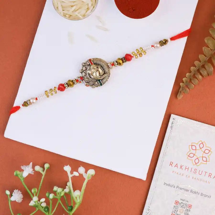 Spiritual Ganesh Rakhi set with Roli Tika and card