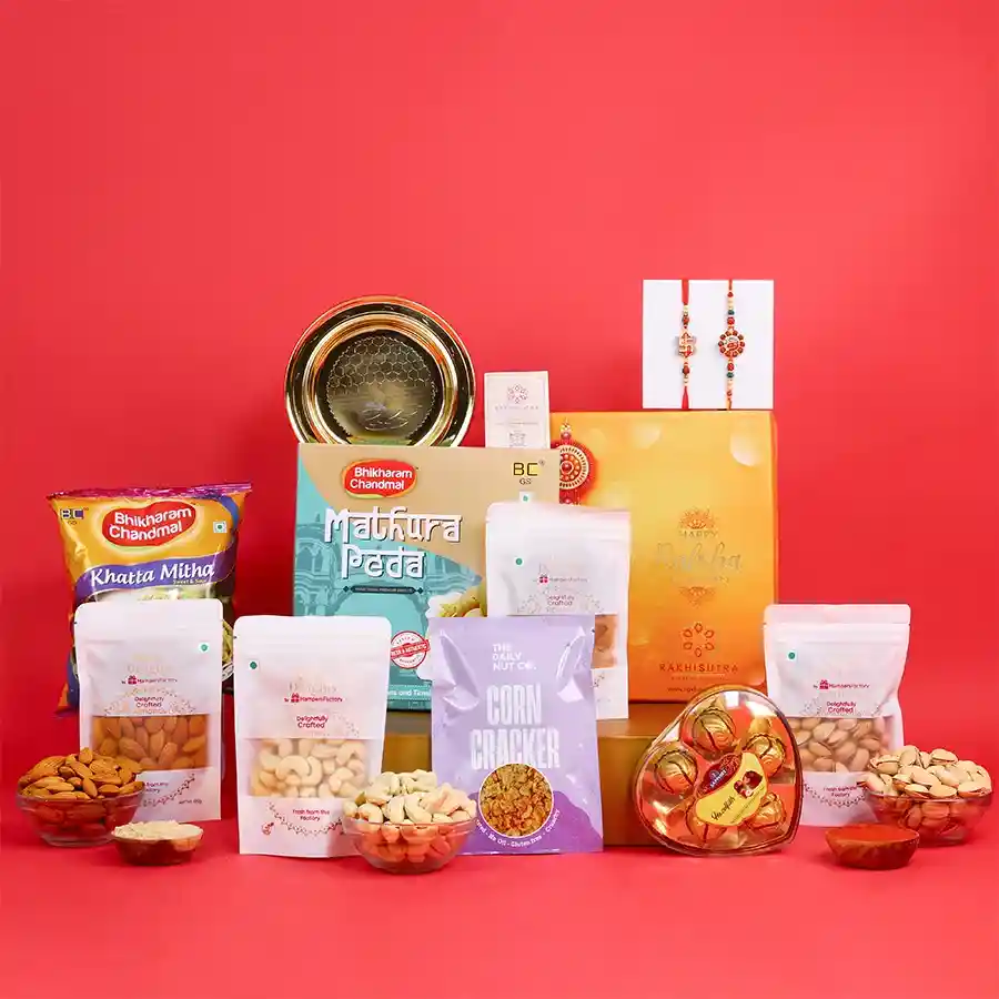 Gourmet Rakhi gift box with assorted treats for Raksha Bandhan.
