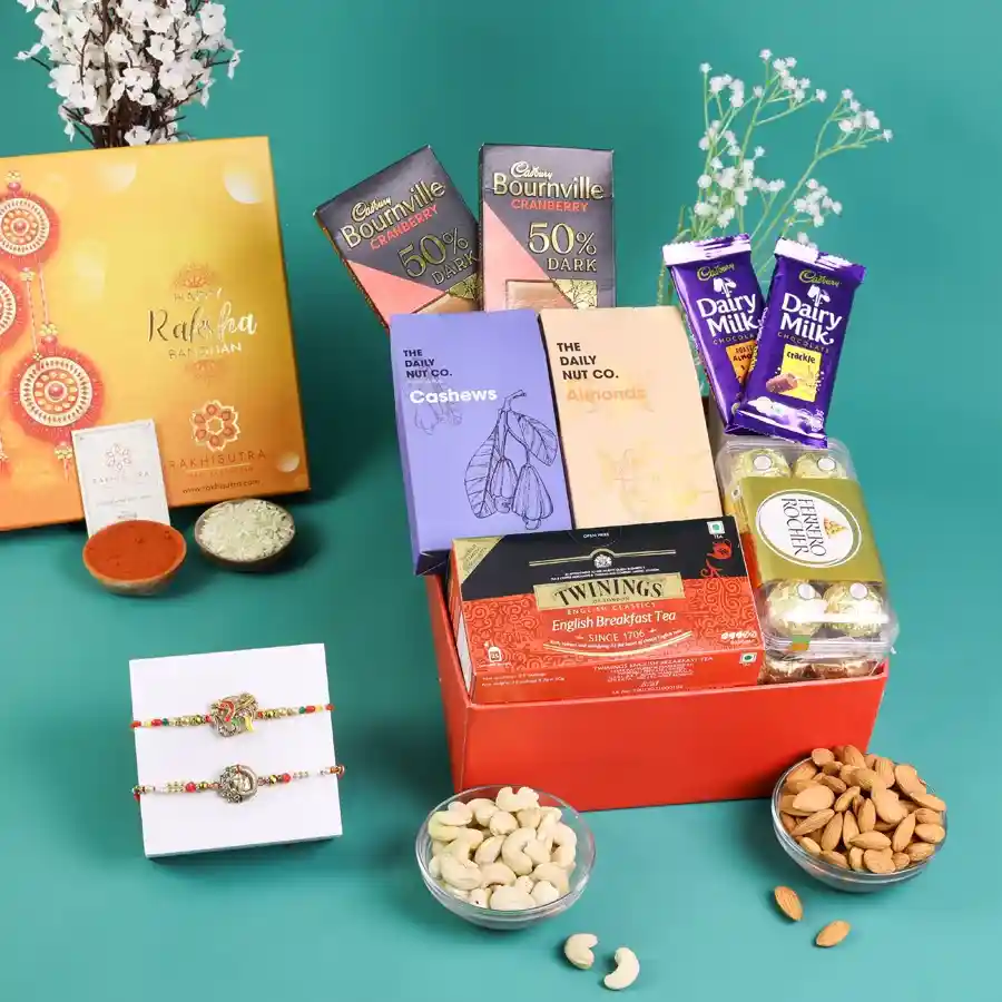 Divine Rakhi and assorted gourmet treats in a gift box