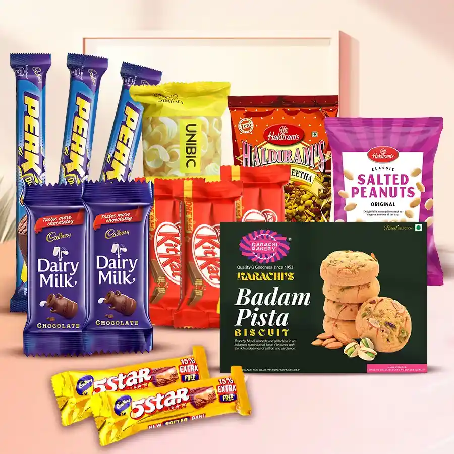 Enticing assortment gift hamper featuring chocolates, cookies, and snacks in a decorative basket.