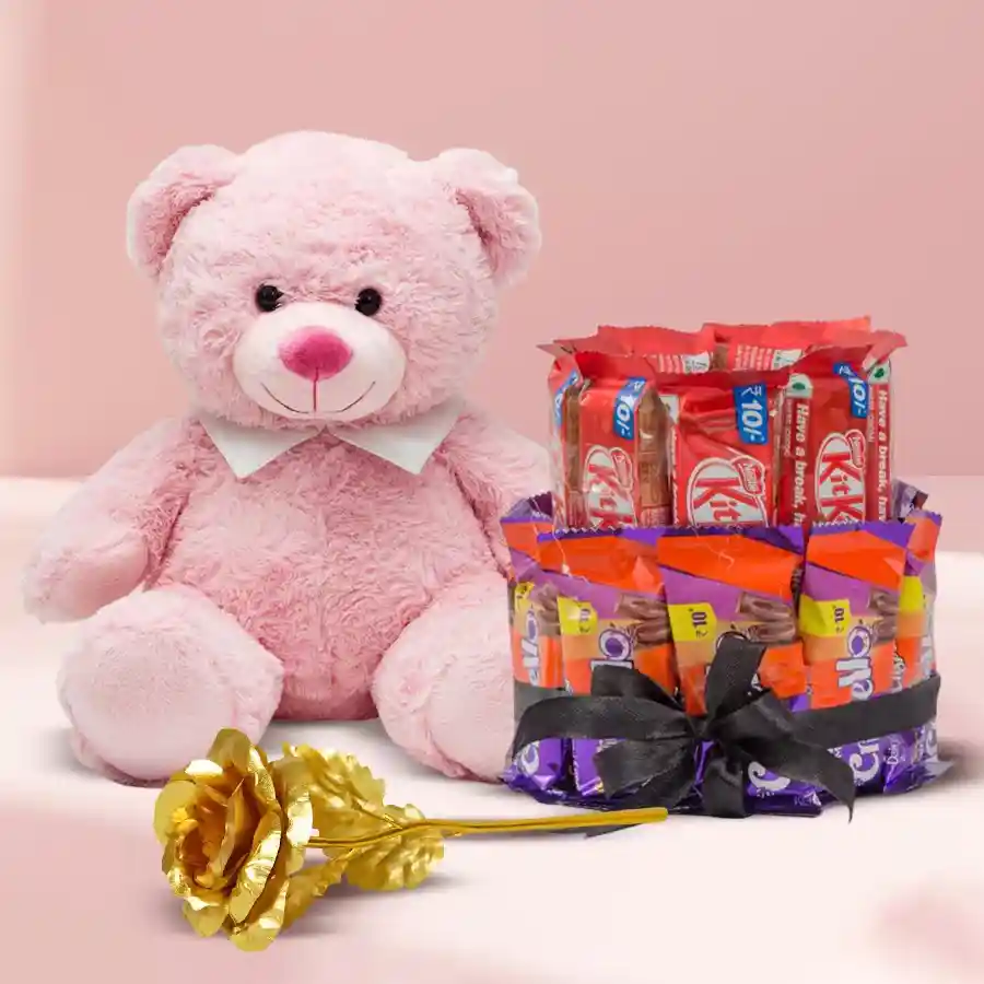 Exclusive Teddy Bundle featuring a plush 12-inch teddy, a golden rose, and a 2-tier chocolate arrangement with Nestle KitKats and Cadbury Crispellos.